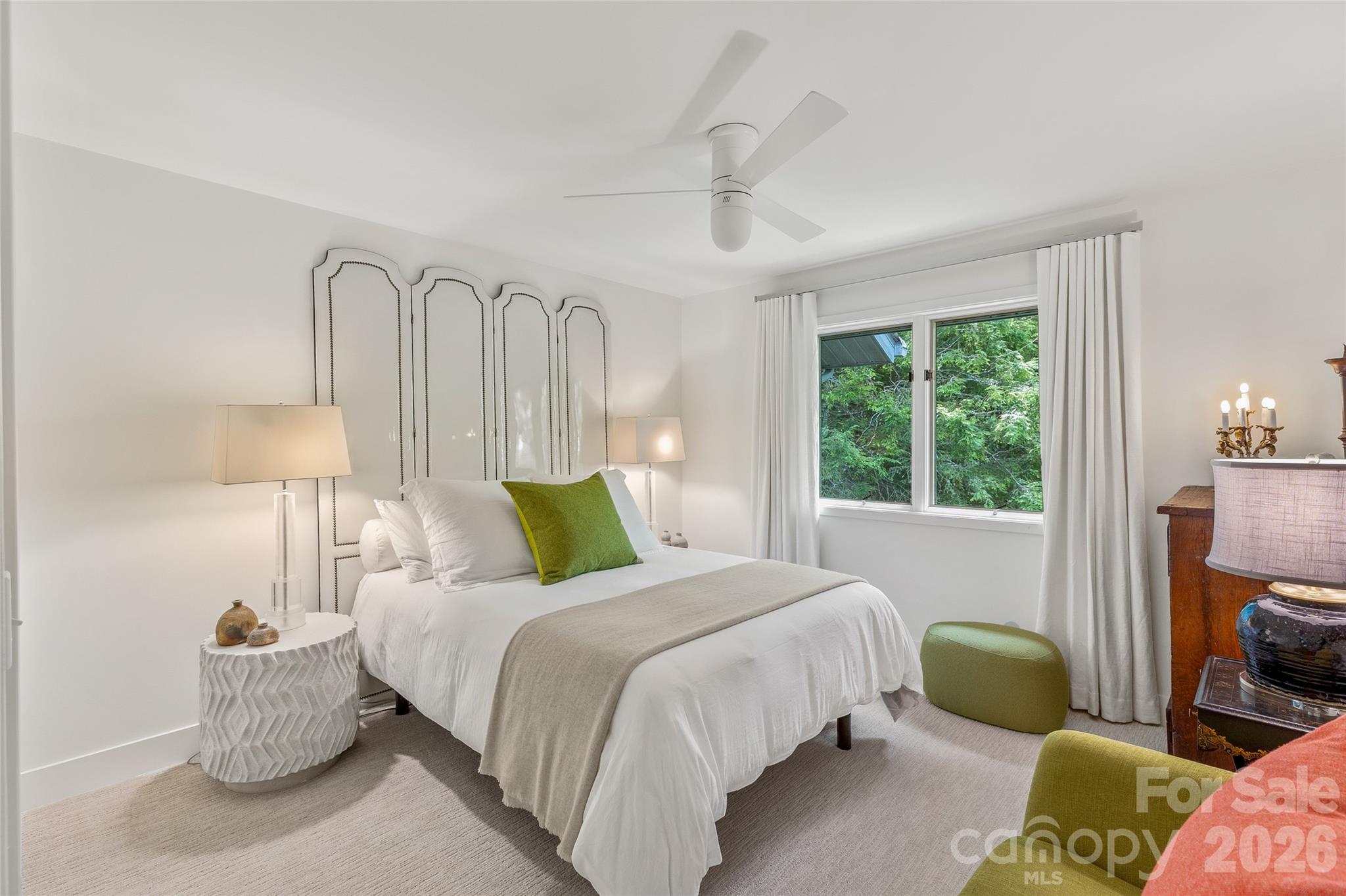 2618 Big Sheepcliff Road Cashiers, NC 28717 - Photo 21 of 35 a bedroom with bed and a window