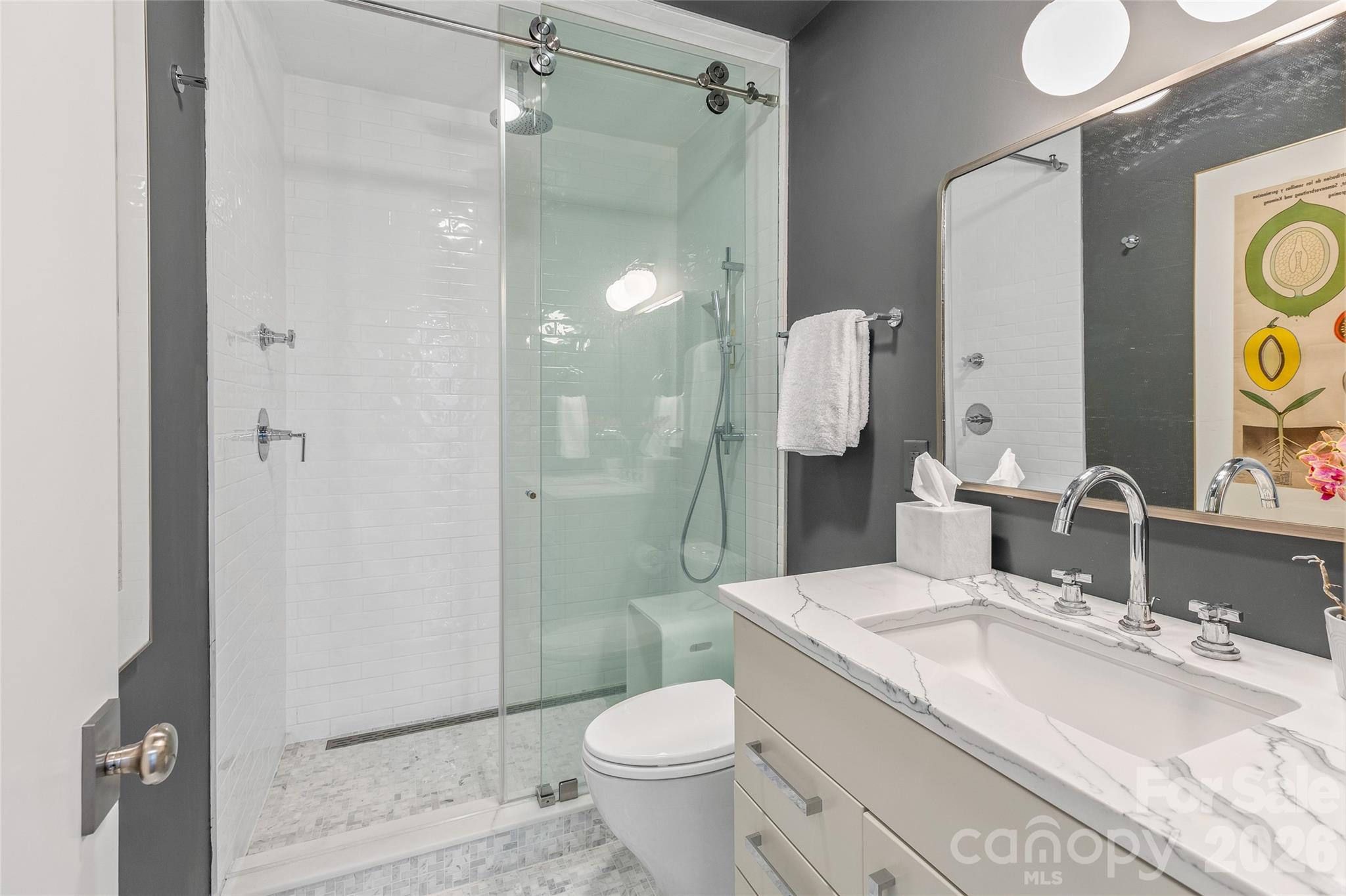 2618 Big Sheepcliff Road Cashiers, NC 28717 - Photo 22 of 35 a bathroom with a sink toilet and shower