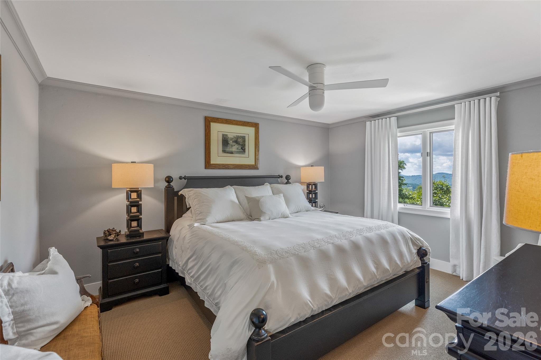 2618 Big Sheepcliff Road Cashiers, NC 28717 - Photo 23 of 35 a bedroom with a bed and wooden floor