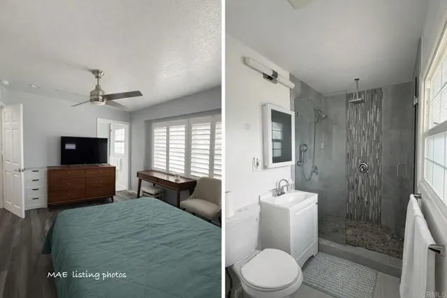 a spacious bathroom with a toilet sink a mirror and shower