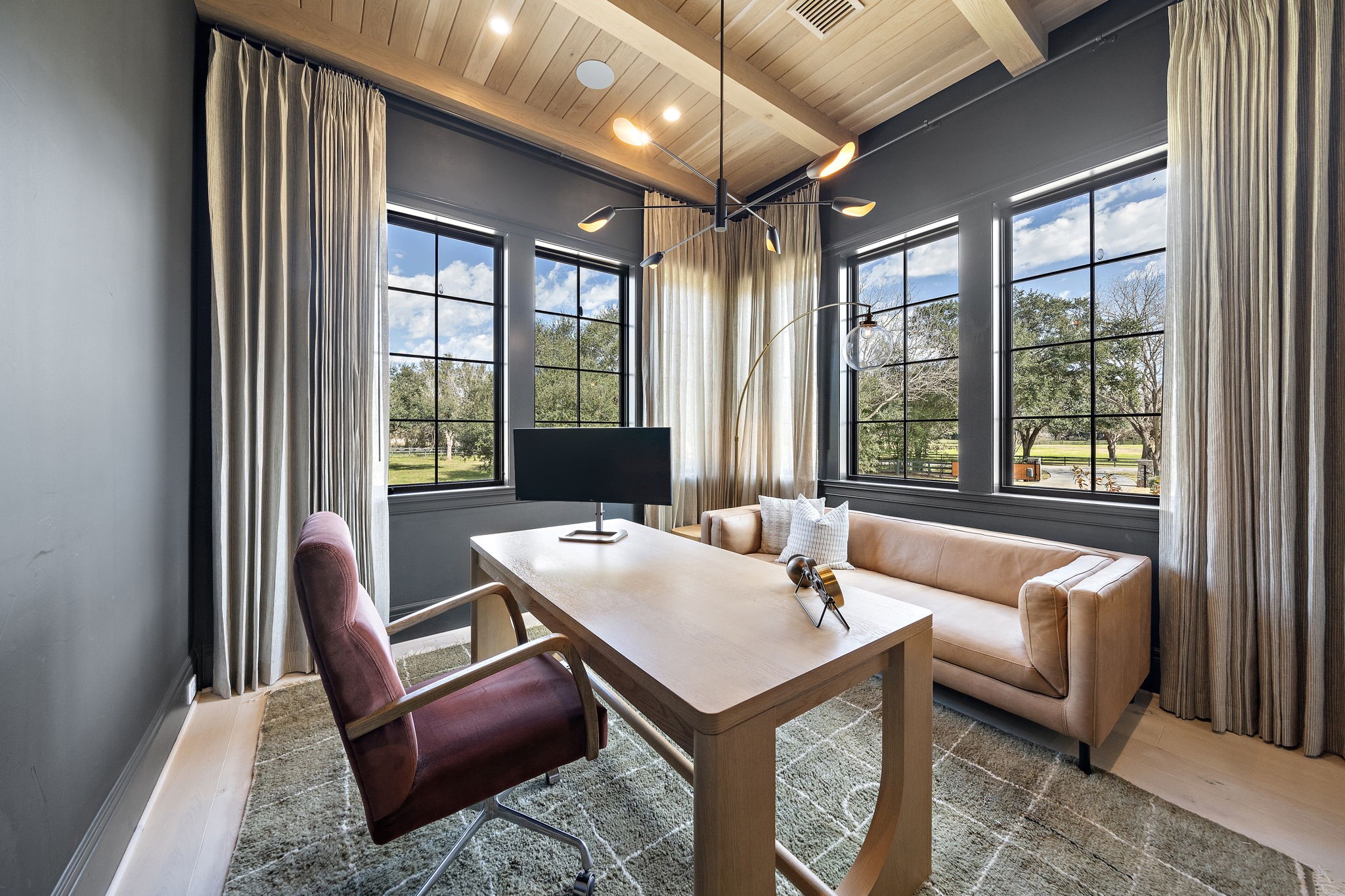 5511 Fulbrook Road Fulshear, TX 77441 - Photo 6 of 50 This home office features wrap around windows offering abundant natural light and scenic views. This room can be used as a secondary guest bedroom as it has an en-suite bathroom and built-in wardrobe.