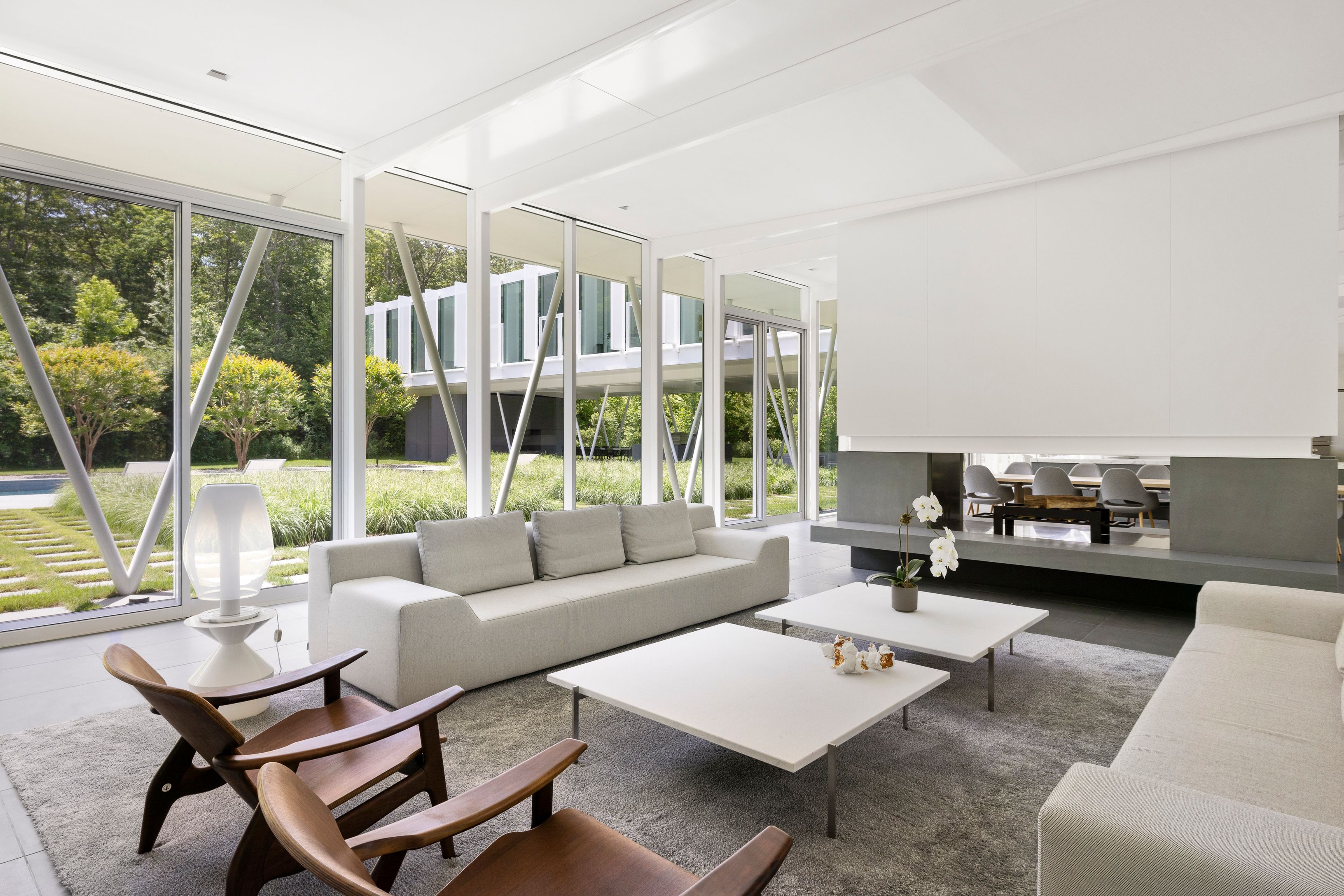13 Terrys Trail East Hampton, NY 11937 - Photo 23 of 51 a living room with furniture and a large window