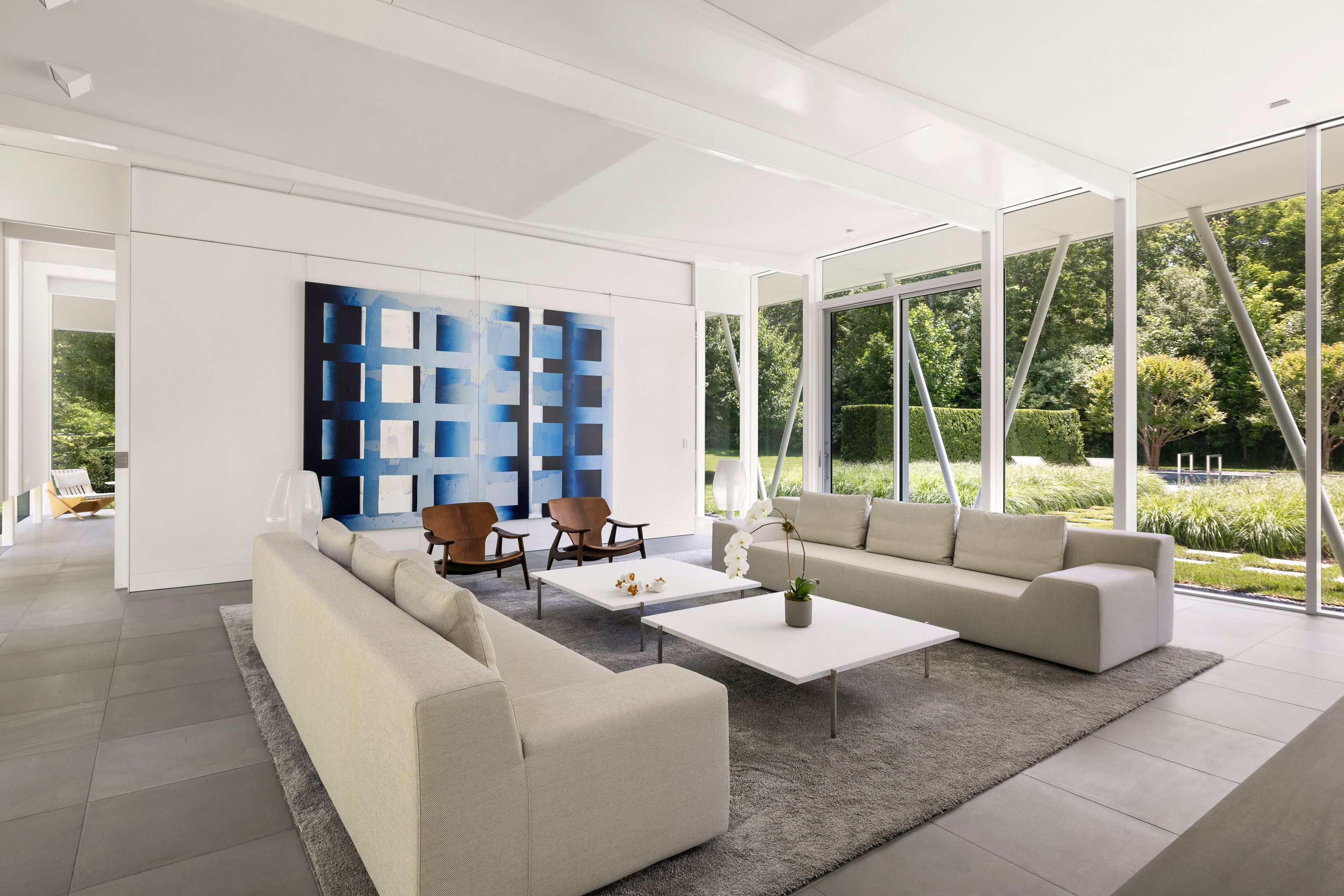 13 Terrys Trail East Hampton, NY 11937 - Photo 24 of 51 a living room with furniture and a large window