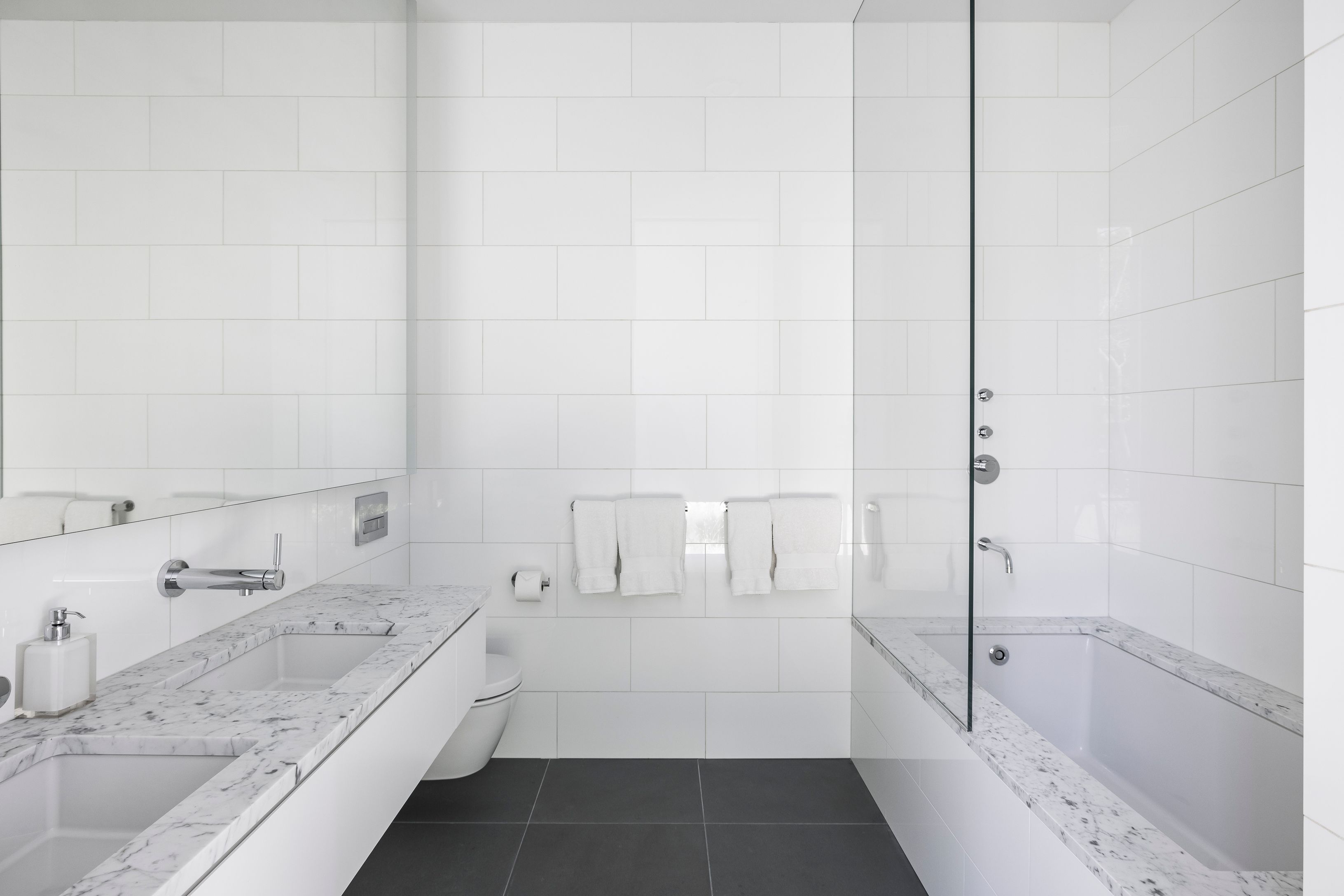 13 Terrys Trail East Hampton, NY 11937 - Photo 30 of 51 a bathroom with a bathtub and a sink