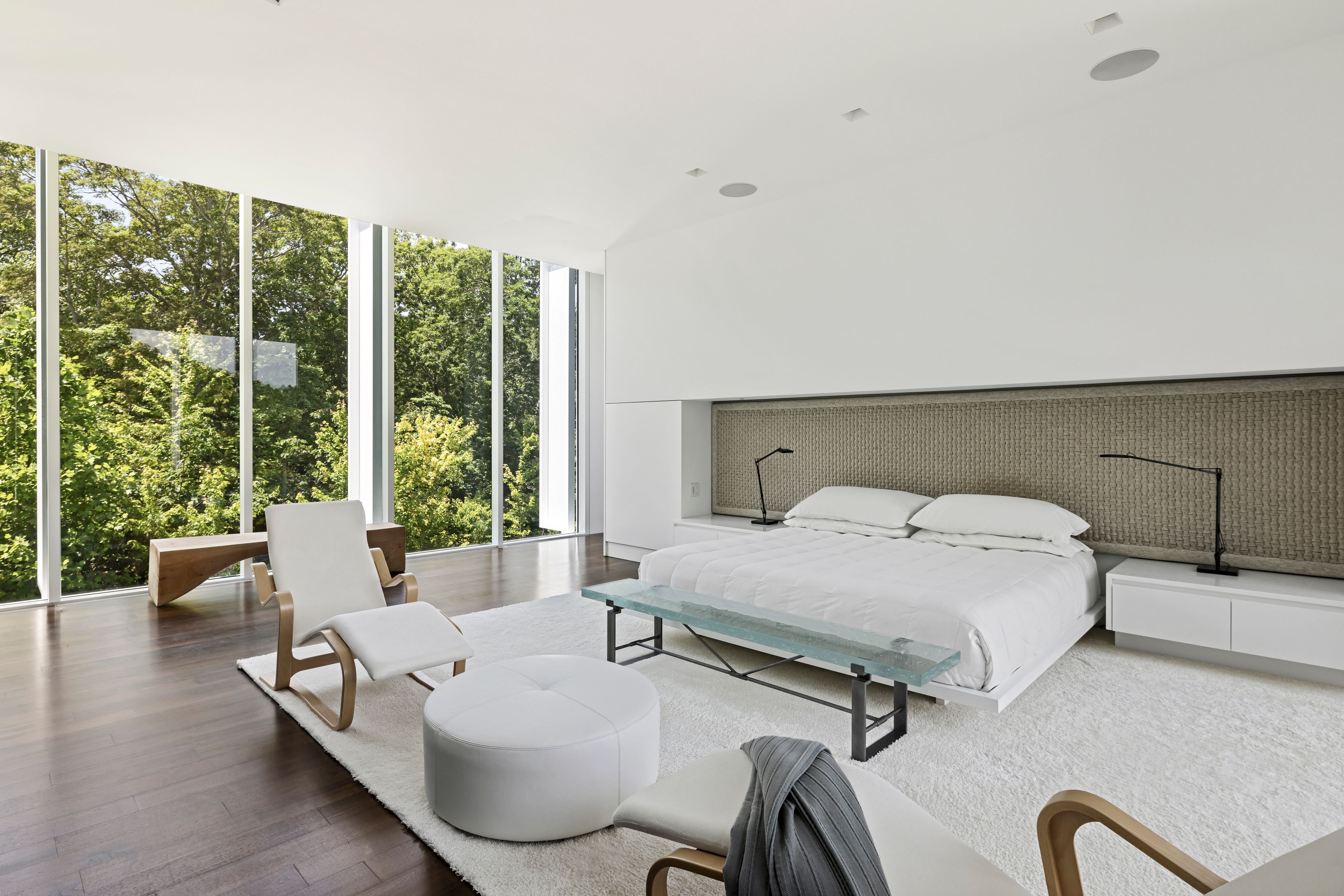 13 Terrys Trail East Hampton, NY 11937 - Photo 32 of 51 a bedroom with a bed and glass window