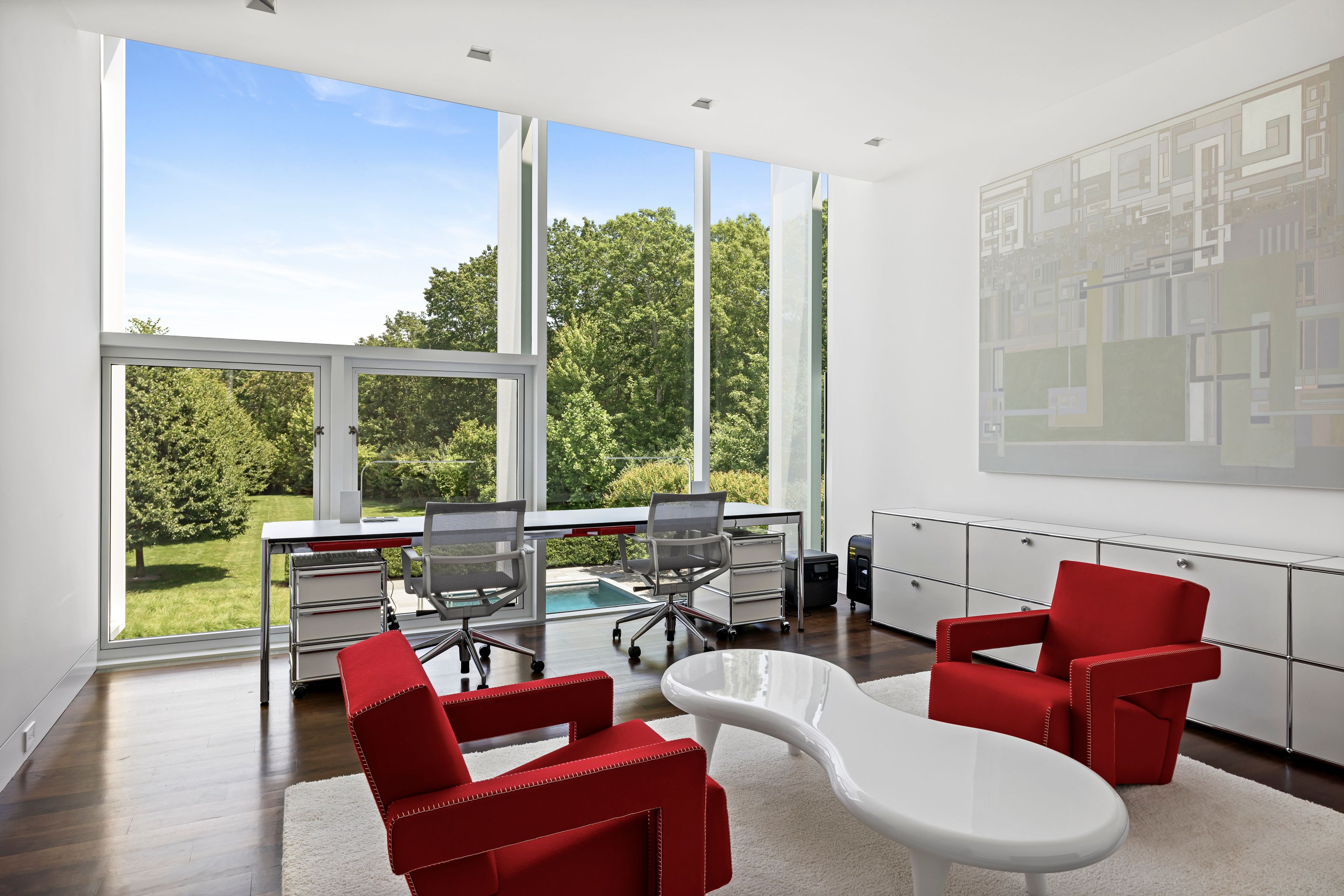 13 Terrys Trail East Hampton, NY 11937 - Photo 36 of 51 a living room with furniture and a large window