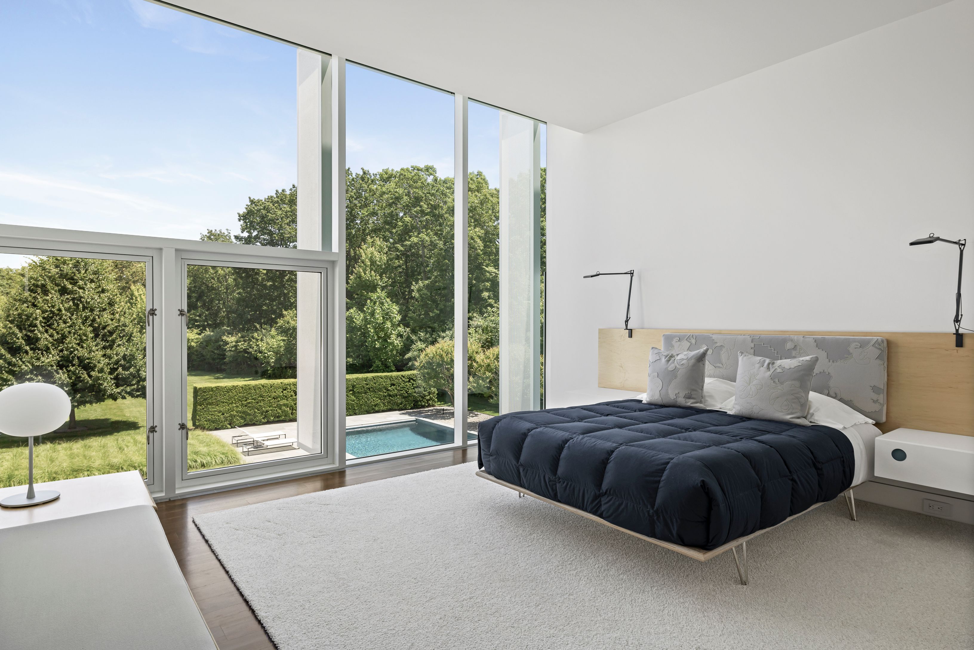 13 Terrys Trail East Hampton, NY 11937 - Photo 40 of 51 a bedroom with a bed and a large window