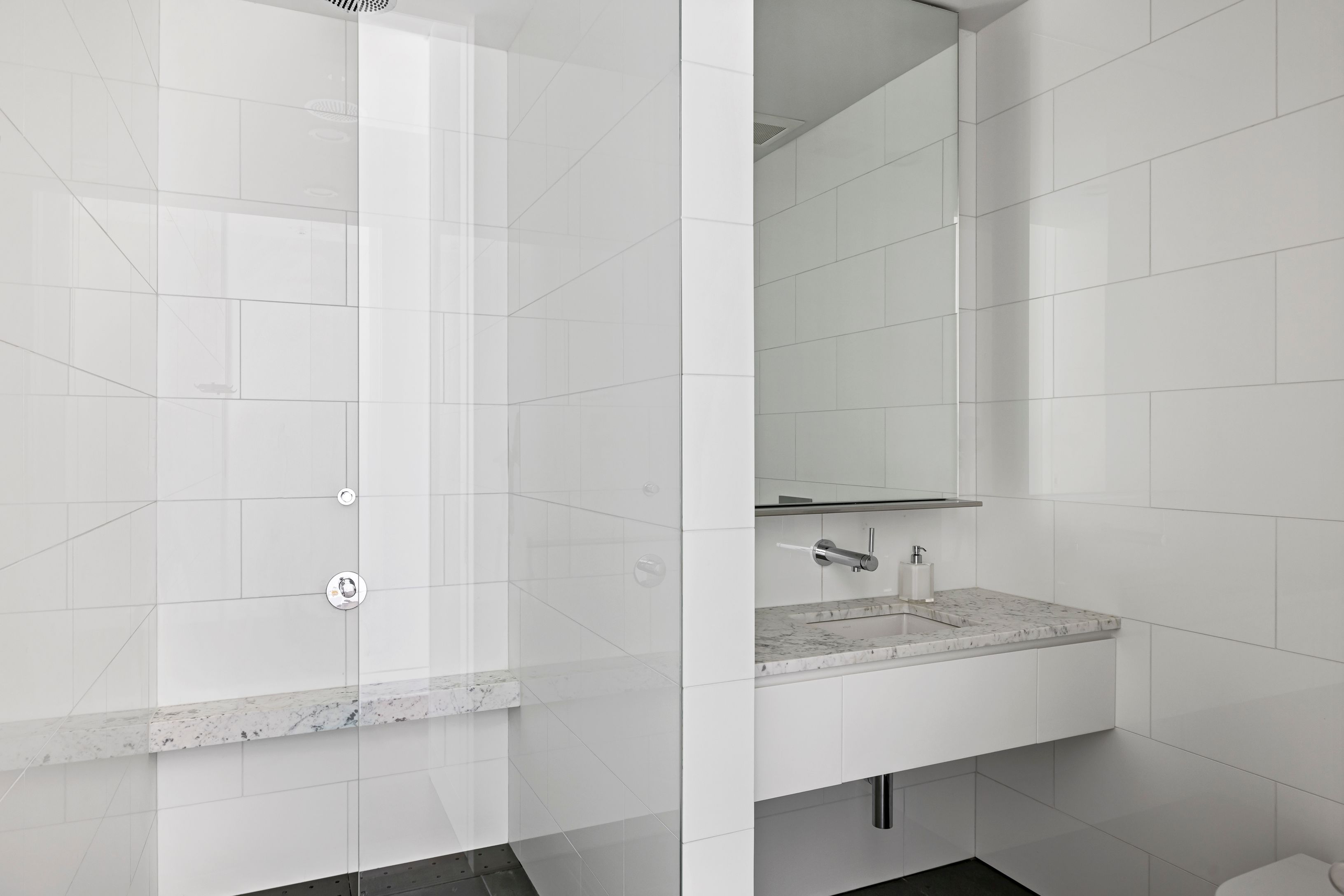 13 Terrys Trail East Hampton, NY 11937 - Photo 41 of 51 a bathroom with a sink and a mirror