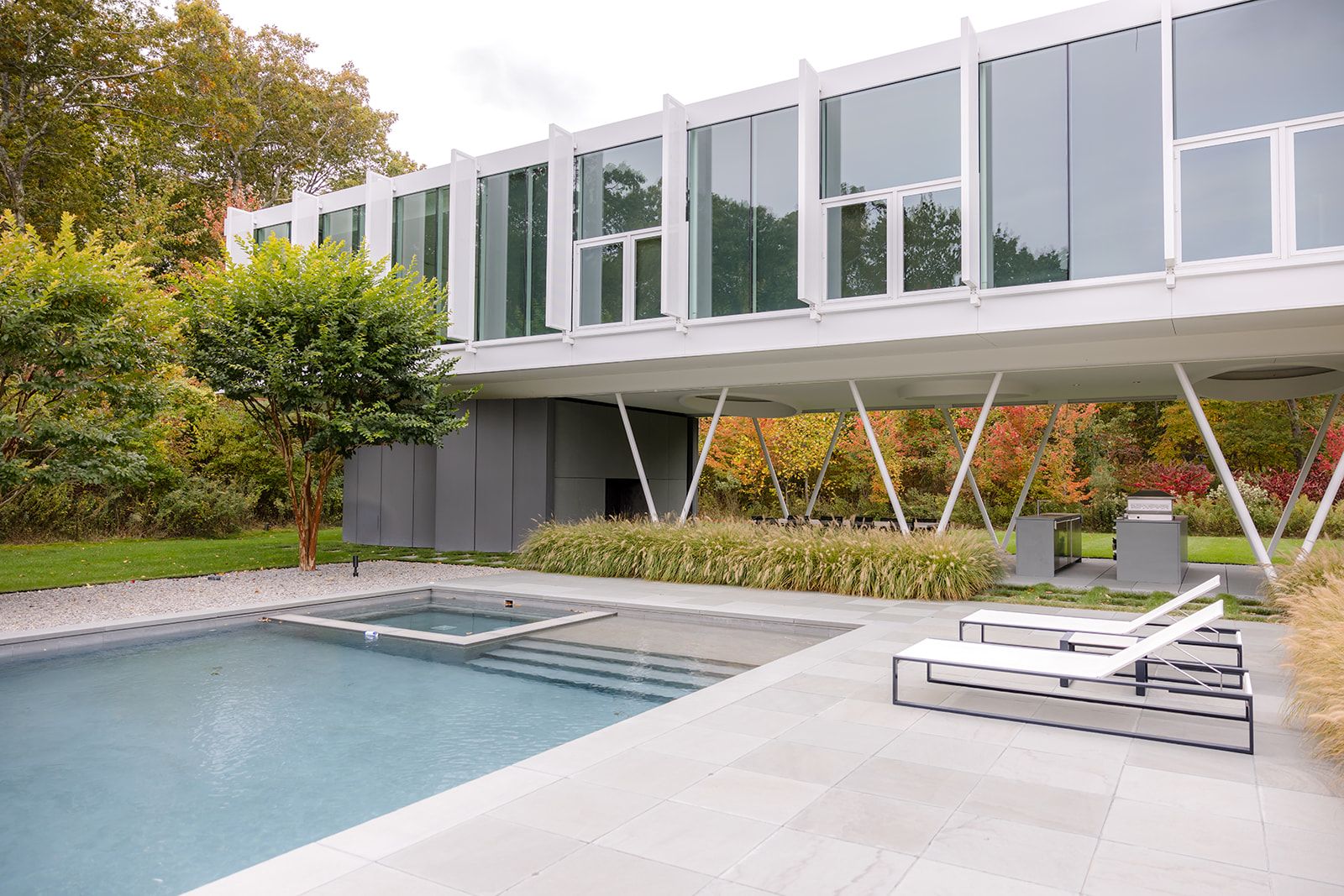 13 Terrys Trail East Hampton, NY 11937 - Photo 45 of 51 a front view of a house with a yard