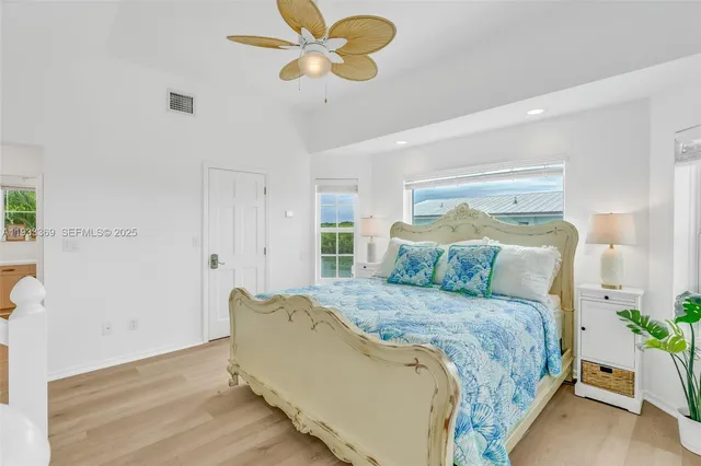 a bathroom with a sink double vanity and a mirror