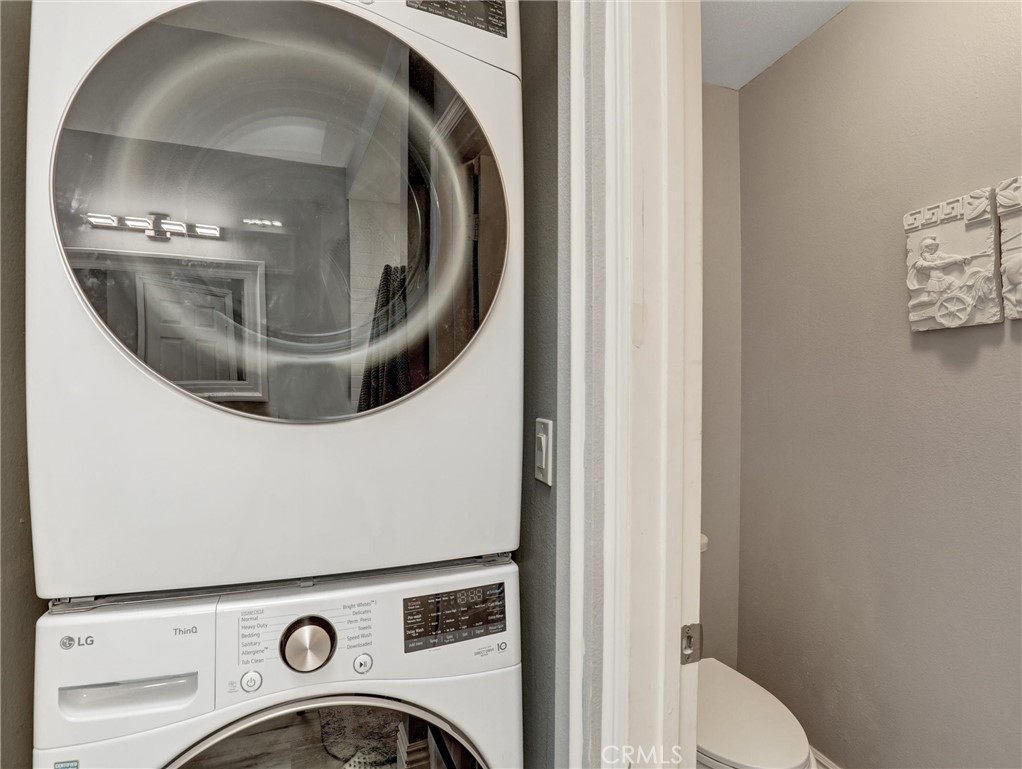 25081 Leucadia Street, Unit F Laguna Niguel, CA 92677 - Photo 19 of 30 a utility room with dryer and washer