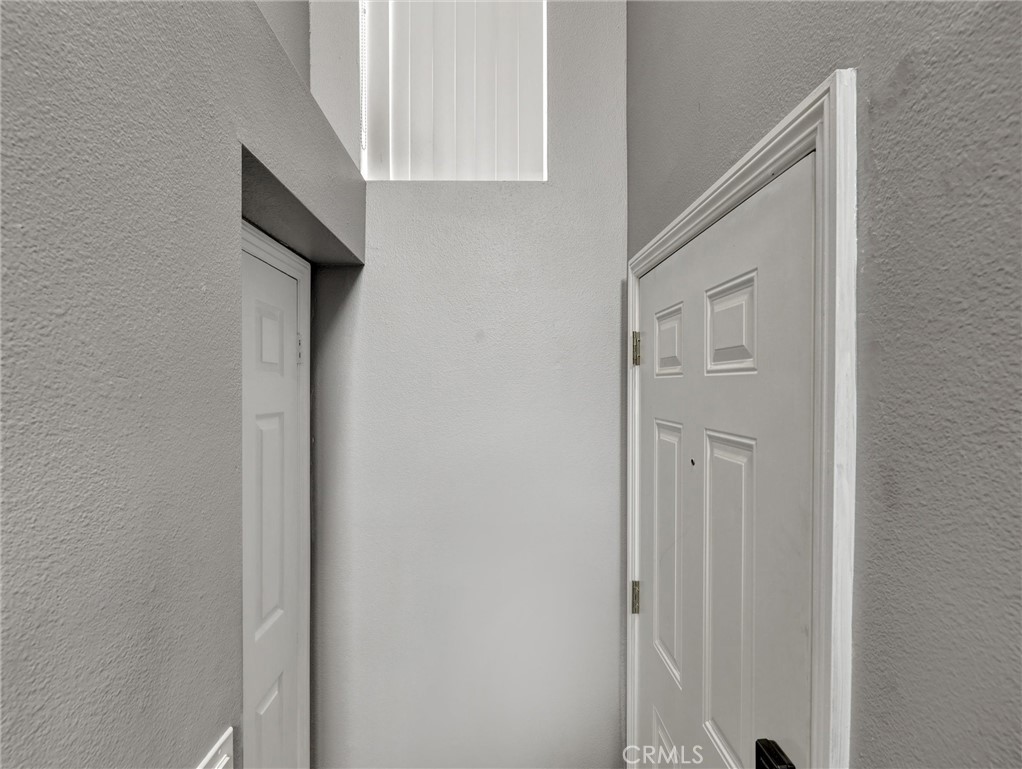 25081 Leucadia Street, Unit F Laguna Niguel, CA 92677 - Photo 20 of 30 a view of a hallway with entryway