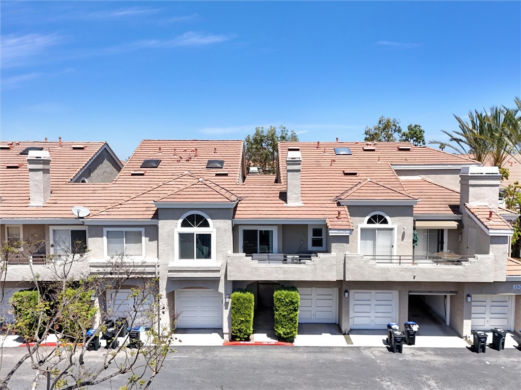 25081 Leucadia Street, Unit F Laguna Niguel, CA 92677 - Photo 22 of 30 a front view of a building with balcony