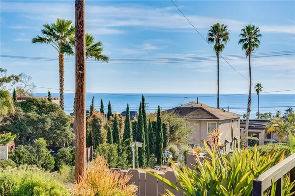 a view of a flower in the middle of a house
