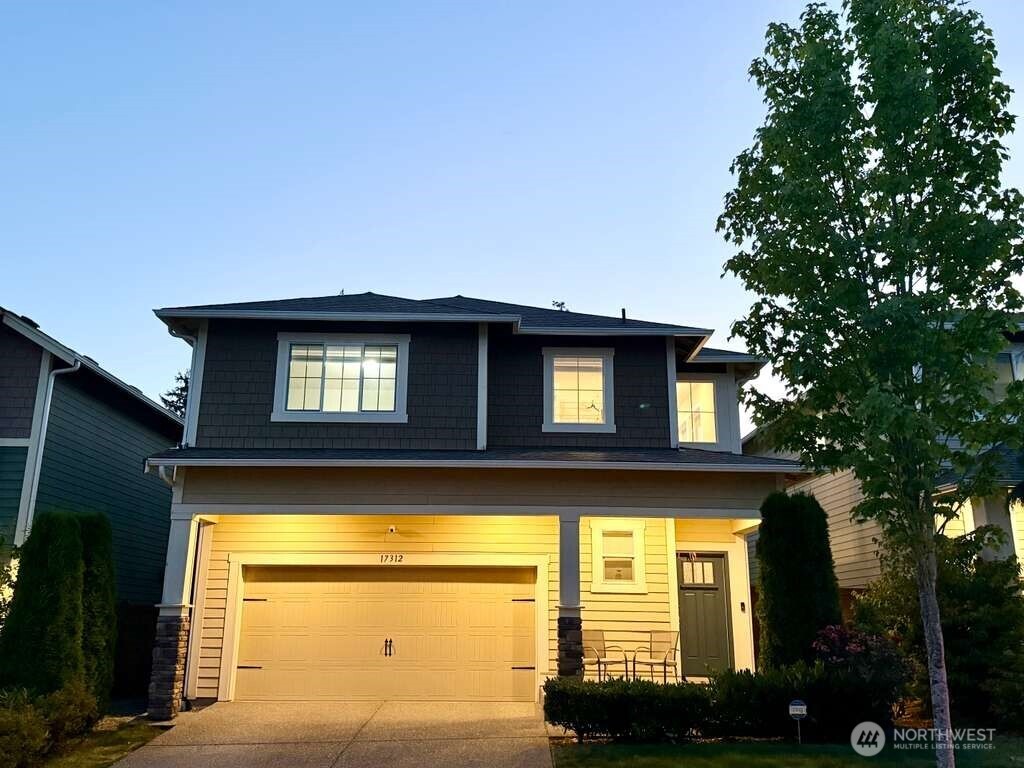 17312 40th Avenue Southeast Bothell, WA 98012 - Photo 34 of 34 a view of a brick house with a large window