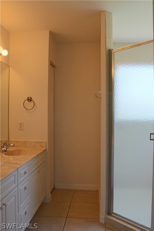 18425 Iris Road Fort Myers, FL 33967 - Photo 18 of 27 a bathroom with a granite countertop sink and a mirror