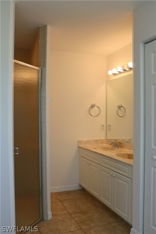 18425 Iris Road Fort Myers, FL 33967 - Photo 19 of 27 a bathroom with a sink and a mirror