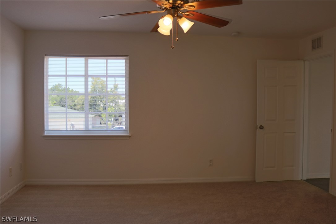18425 Iris Road Fort Myers, FL 33967 - Photo 20 of 27 an empty room with window