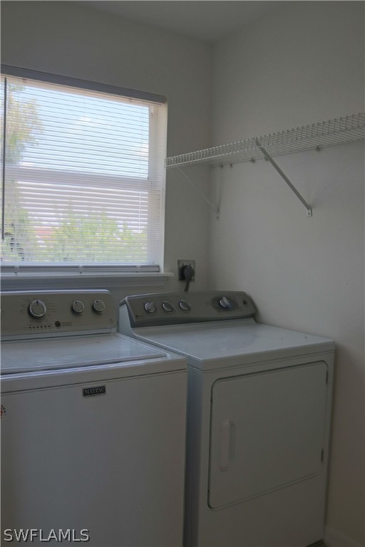 18425 Iris Road Fort Myers, FL 33967 - Photo 22 of 27 a utility room with dryer and washer