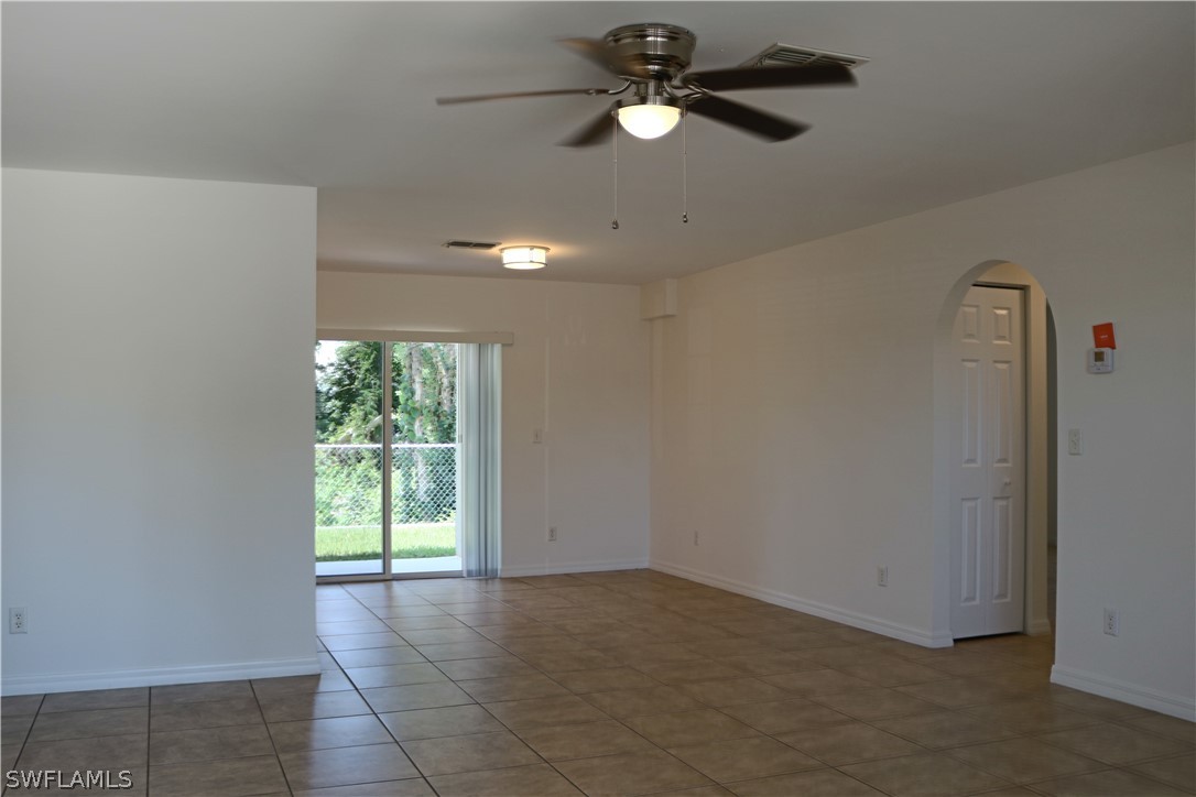 18425 Iris Road Fort Myers, FL 33967 - Photo 4 of 27 a view of an empty room with a window