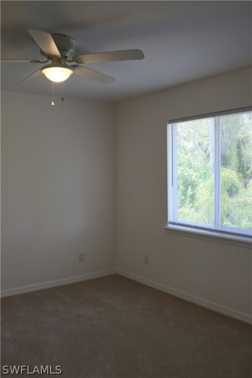 18425 Iris Road Fort Myers, FL 33967 - Photo 6 of 27 an empty room with a window