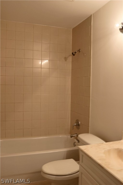 18425 Iris Road Fort Myers, FL 33967 - Photo 8 of 27 a bathroom with a toilet and shower
