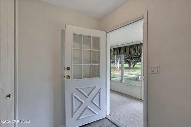 a view of backyard with green space