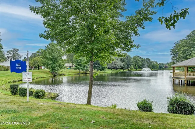 a view of outdoor space with garden and trees