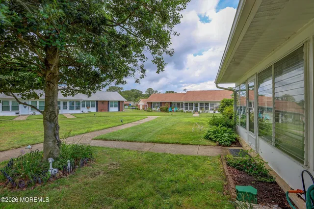 a view of house with garden