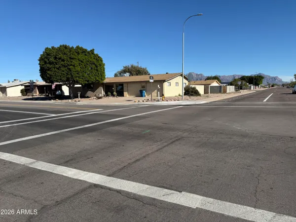 a view of a street with houses