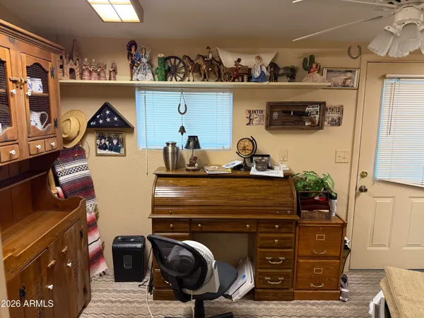 a room with a cabinets and wooden floor