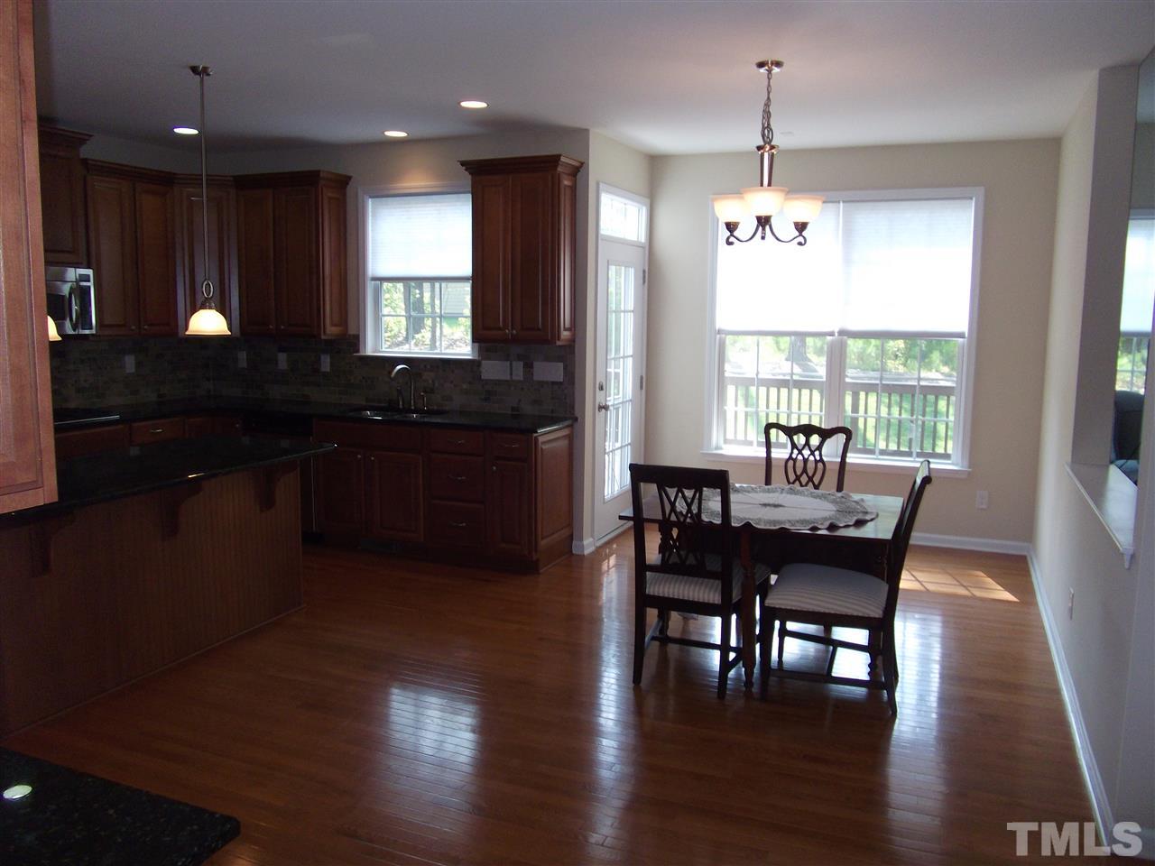 2993 Rolling Hill Road Durham, NC 27705 - Photo 12 of 25 Plenty of room in the breakfast area for "large family table".