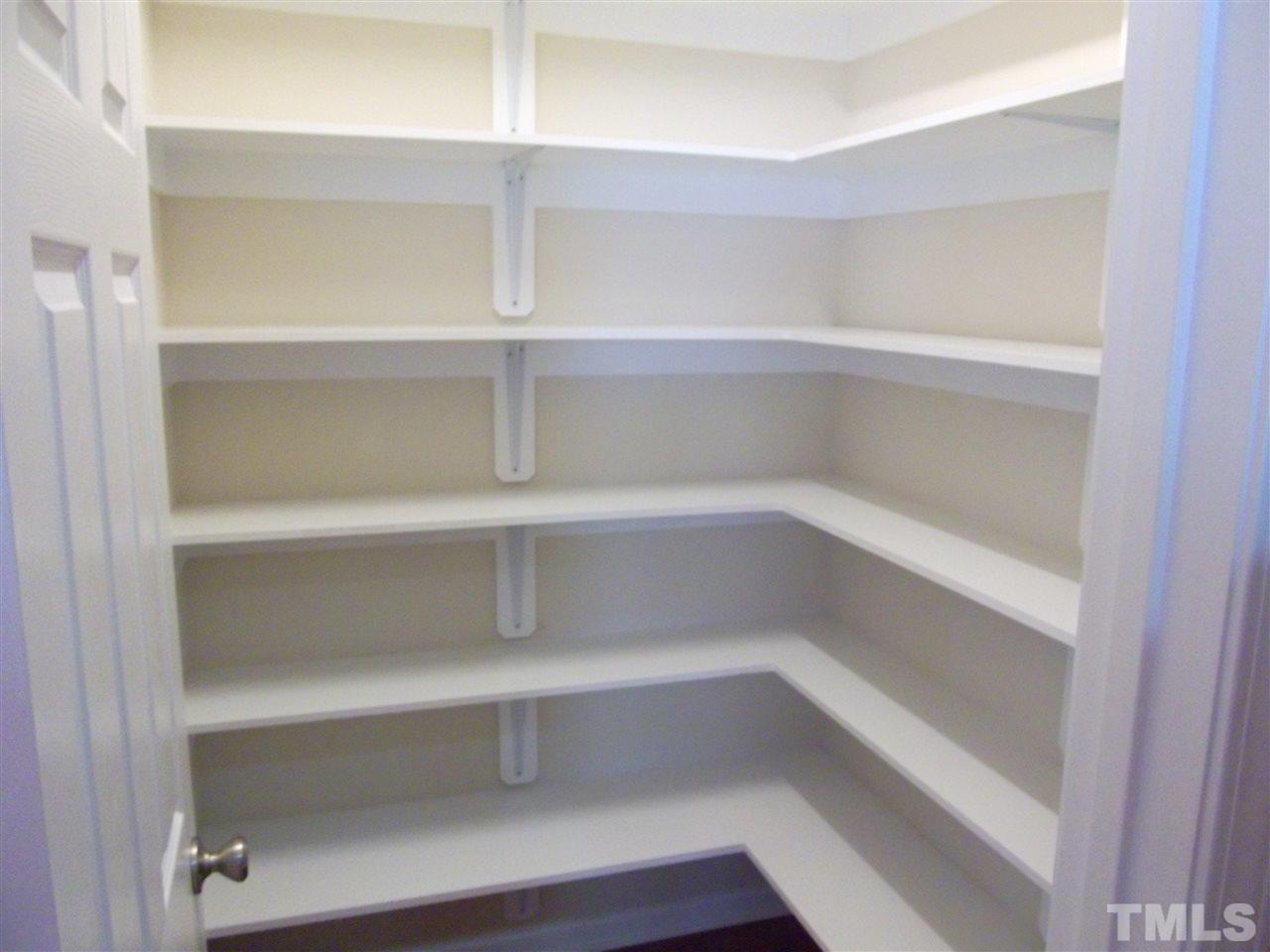 2993 Rolling Hill Road Durham, NC 27705 - Photo 15 of 25 Pantry is 7x5 (walk-in) with custom shelving.