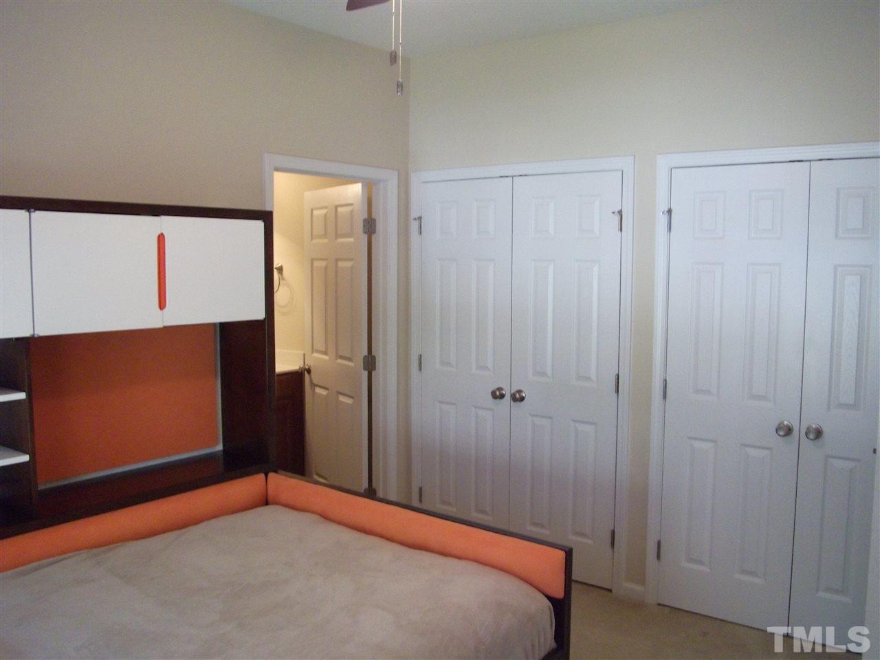 2993 Rolling Hill Road Durham, NC 27705 - Photo 24 of 25 The 4th bedroom upstairs has "own" full bath as well as double closets!