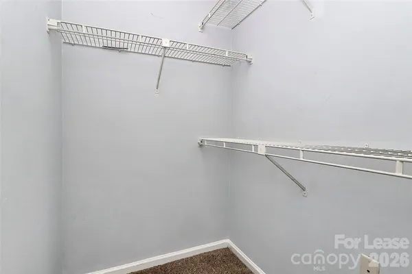 a view of a room with racks on the wall