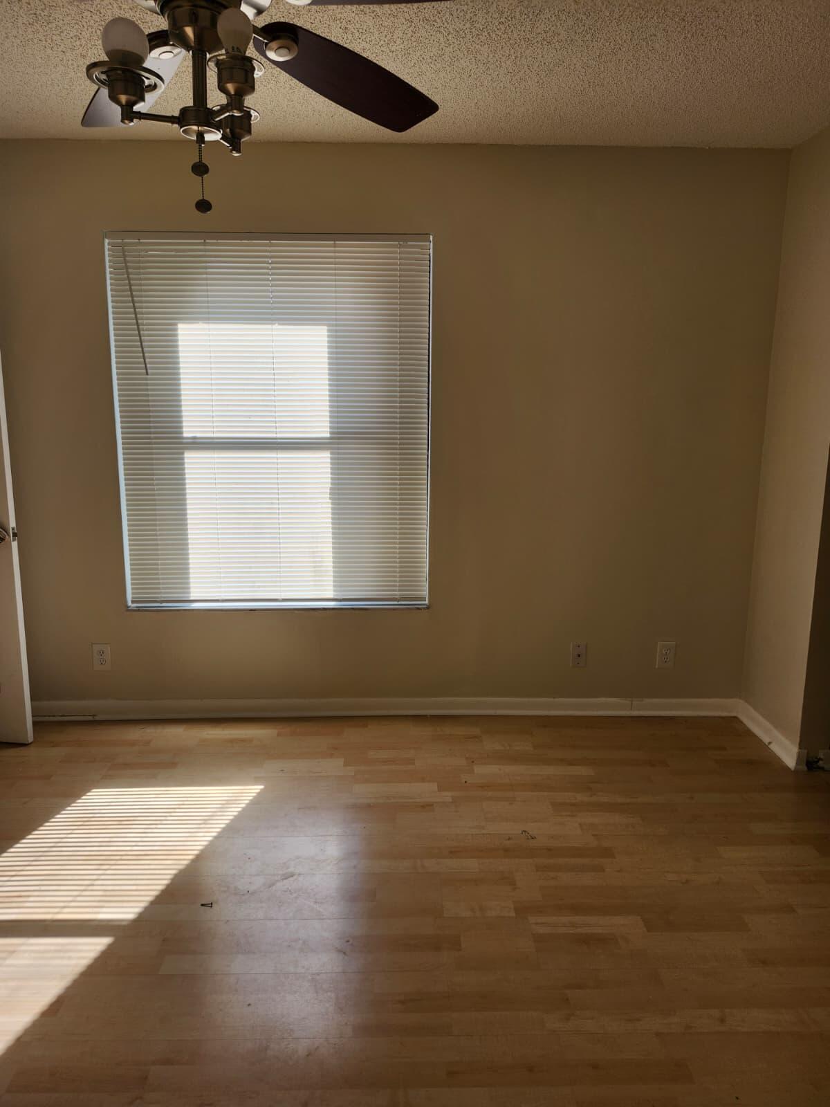 7519 Courtyard Run East Boca Raton, FL 33433 - Photo 22 of 29 a view of an empty room with a window