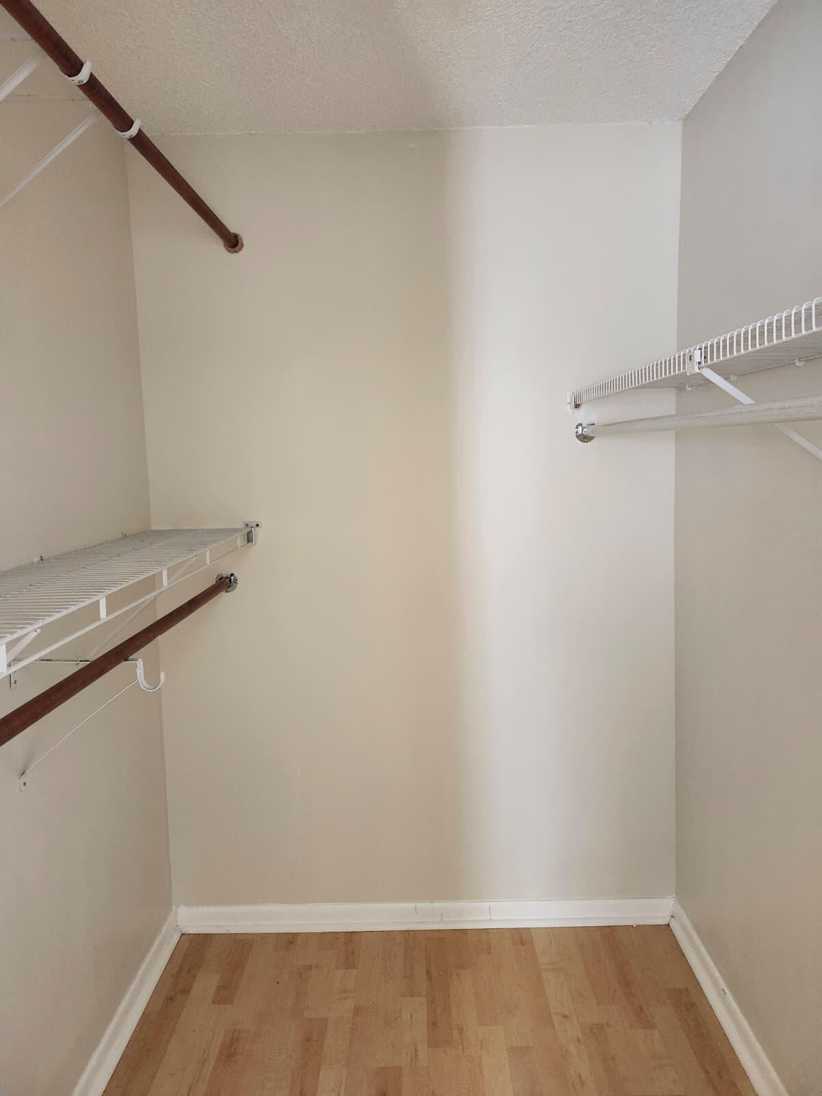 7519 Courtyard Run East Boca Raton, FL 33433 - Photo 23 of 29 a view of small space with racks on the wall