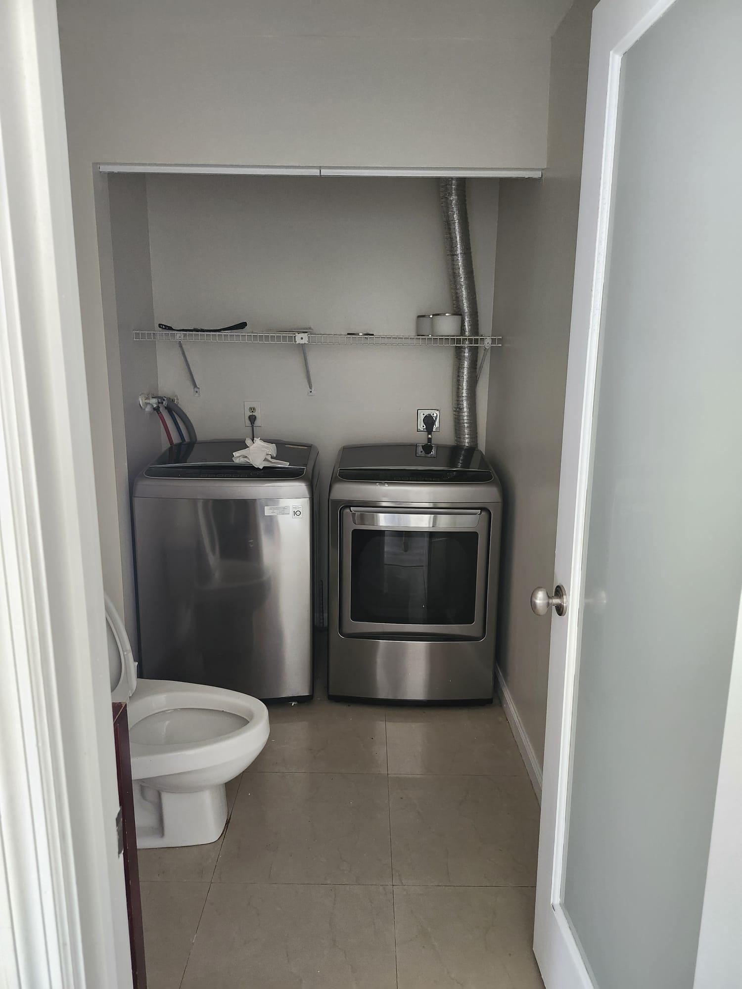 7519 Courtyard Run East Boca Raton, FL 33433 - Photo 6 of 29 a stove top oven sitting inside of a kitchen