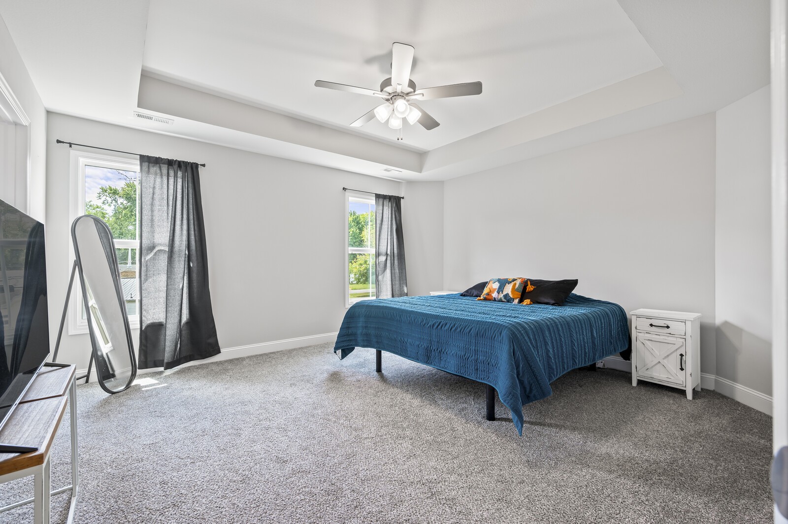 246 King Road Clarksville, TN 37042 - Photo 12 of 21 a bedroom with a bed and a chandelier