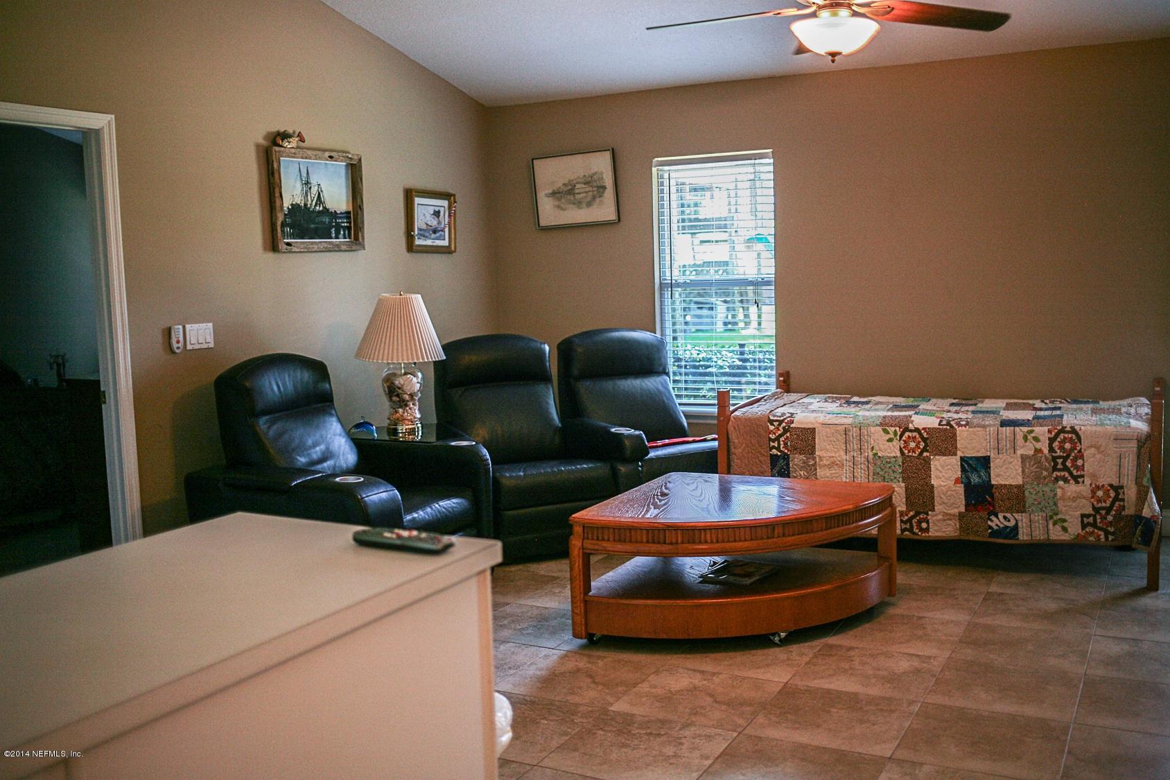 3967 Eunice Road Jacksonville, FL 32250 - Photo 25 of 28 a living room with furniture and a window