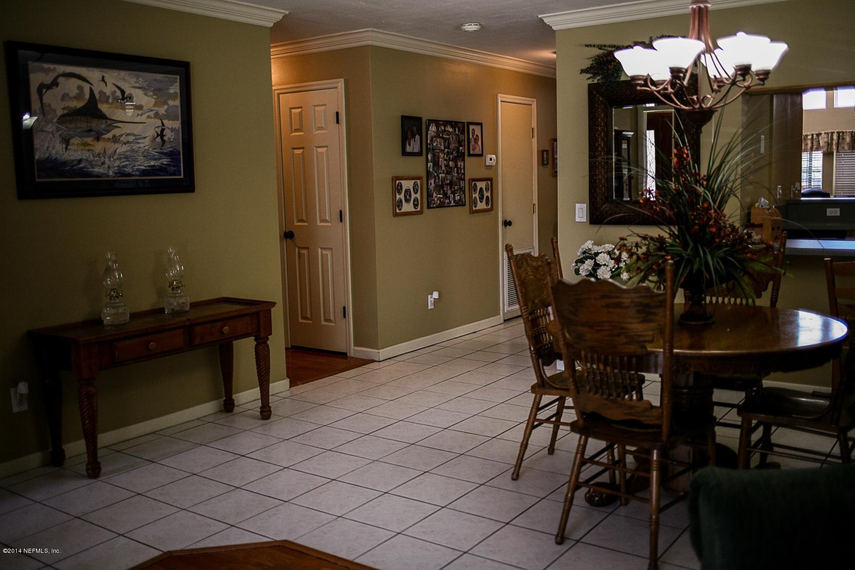 3967 Eunice Road Jacksonville, FL 32250 - Photo 5 of 28 a view of a dining room with furniture