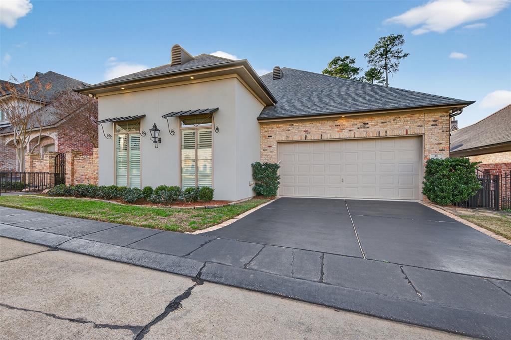 7717 Creswell Road, Unit 48 Shreveport, LA 71106 - Photo 2 of 37 a view of a white house with a street