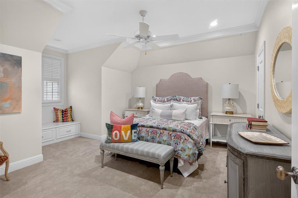 7717 Creswell Road, Unit 48 Shreveport, LA 71106 - Photo 27 of 37 a bedroom with a bed and a chandelier