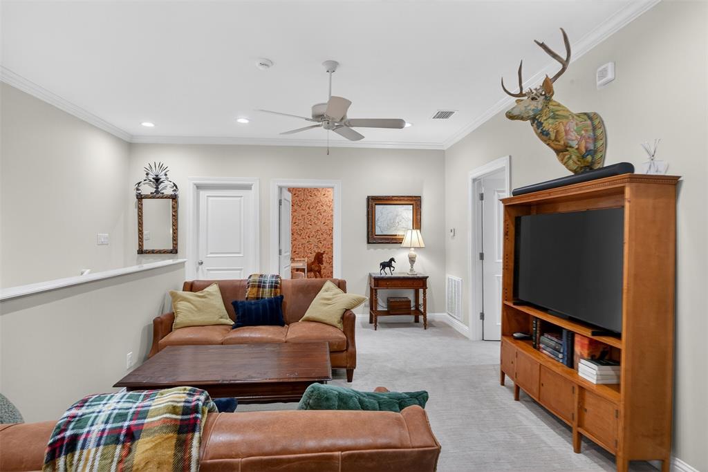 7717 Creswell Road, Unit 48 Shreveport, LA 71106 - Photo 30 of 37 a living room with furniture and a flat screen tv