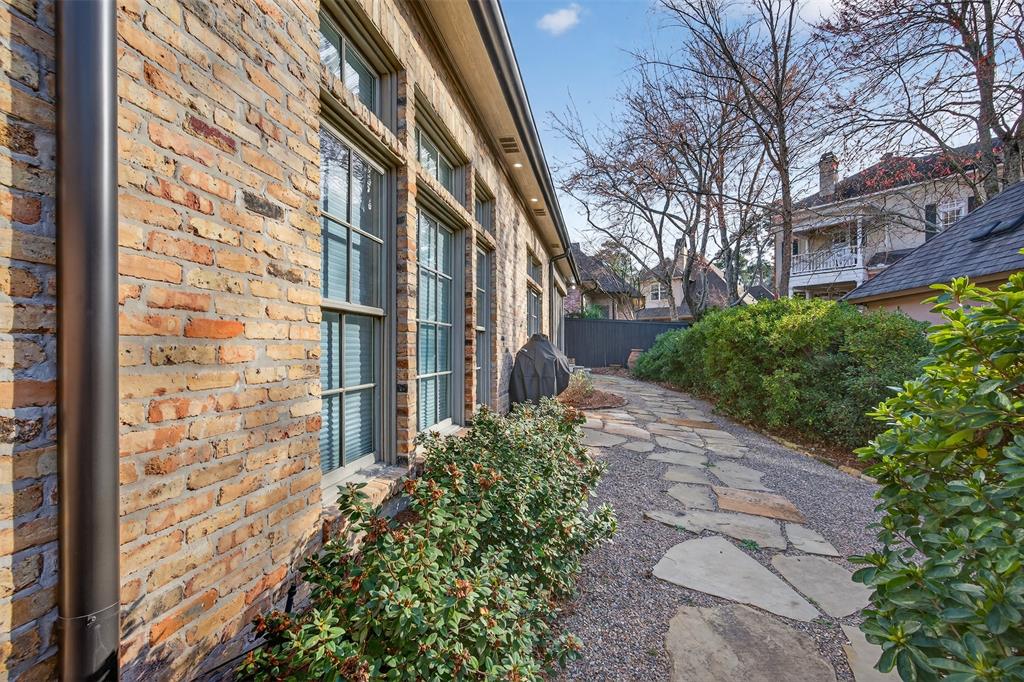 7717 Creswell Road, Unit 48 Shreveport, LA 71106 - Photo 36 of 37 a brick building with a large windows