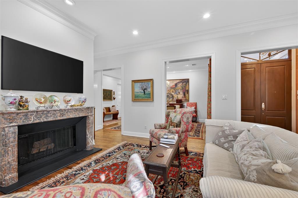 7717 Creswell Road, Unit 48 Shreveport, LA 71106 - Photo 5 of 37 a living room with furniture a flat screen tv and a fireplace