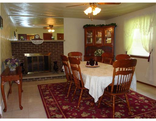 115 Township Line Road Butler, PA 16002 - Photo 9 of 18 Dining Room. Woodburning fireplace in the 17x13 dining room