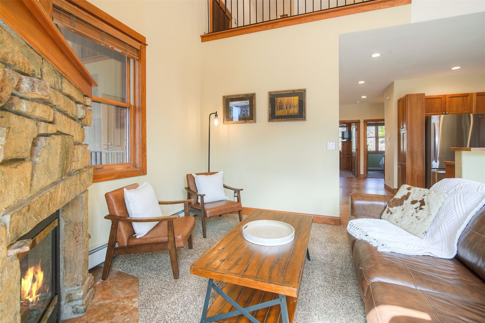 71 Antlers Gulch Road, Unit 303 Keystone, CO 80435 - Photo 11 of 35 a living room with furniture and a window