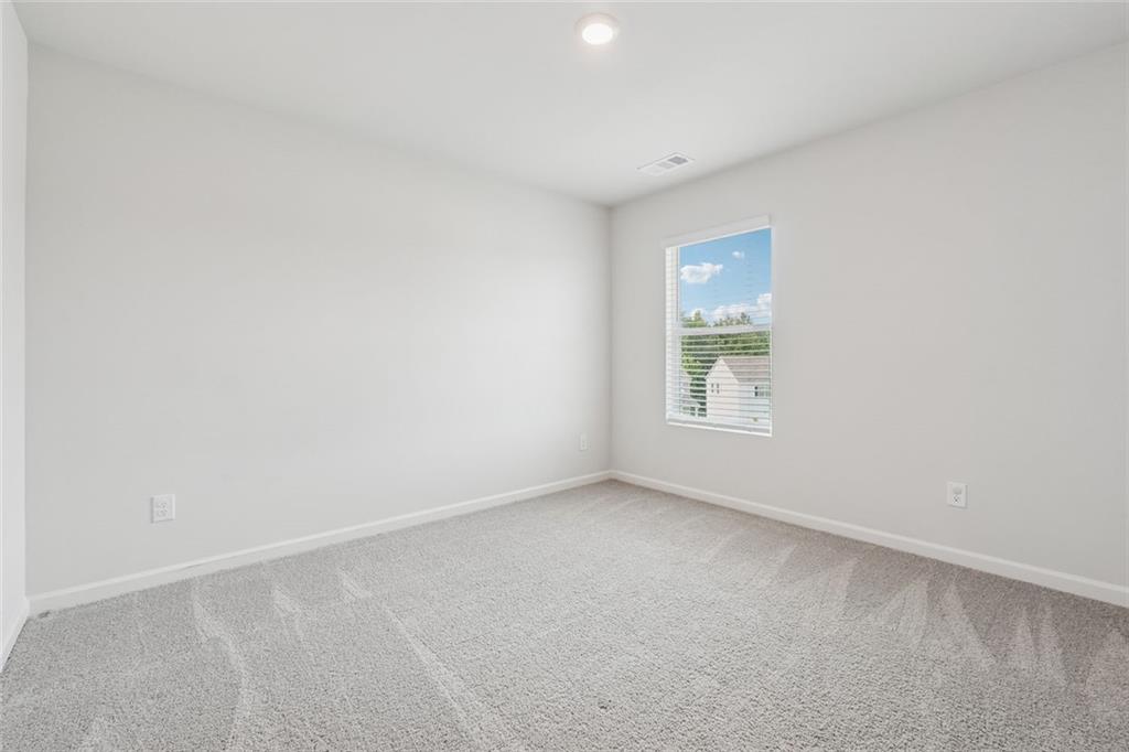 96 Quail Bend Way Dallas, GA 30157 - Photo 33 of 57 an empty room with a window