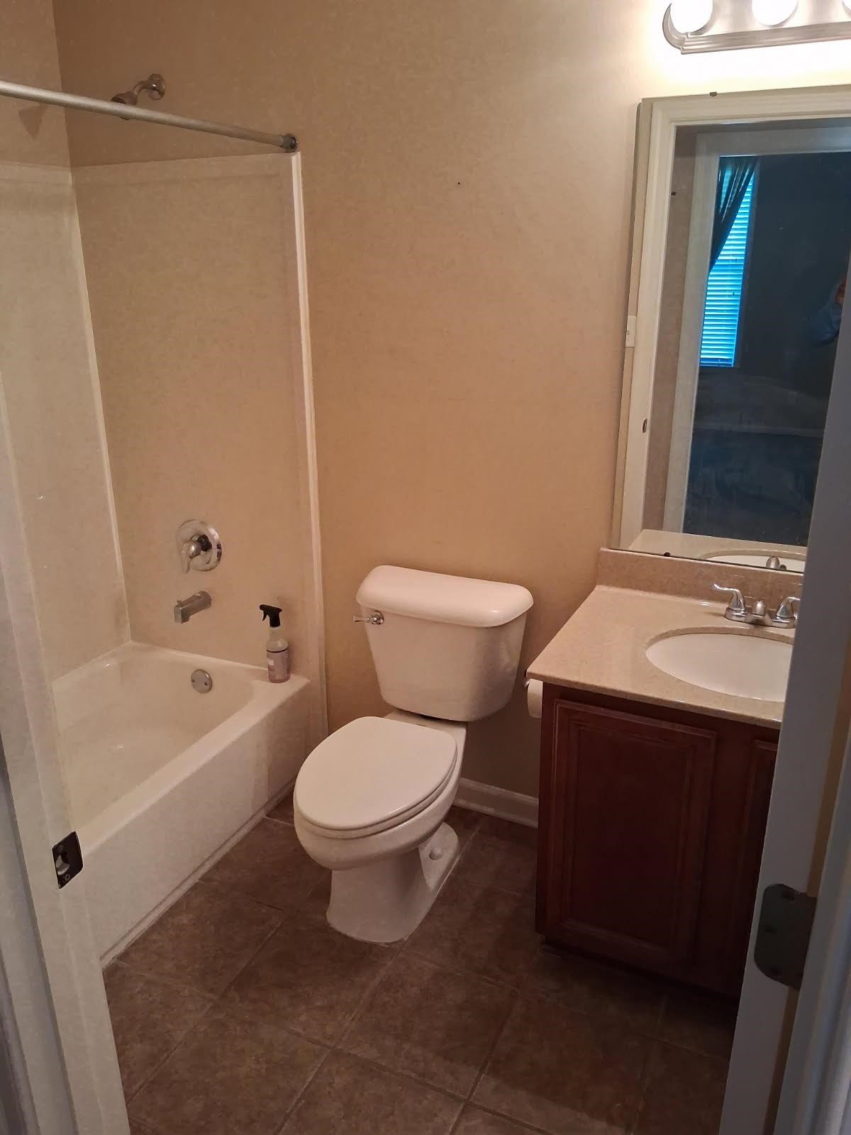 10481 Mabry Mill Road Cordova, TN 38016 - Photo 12 of 32 a bathroom with a sink toilet and shower